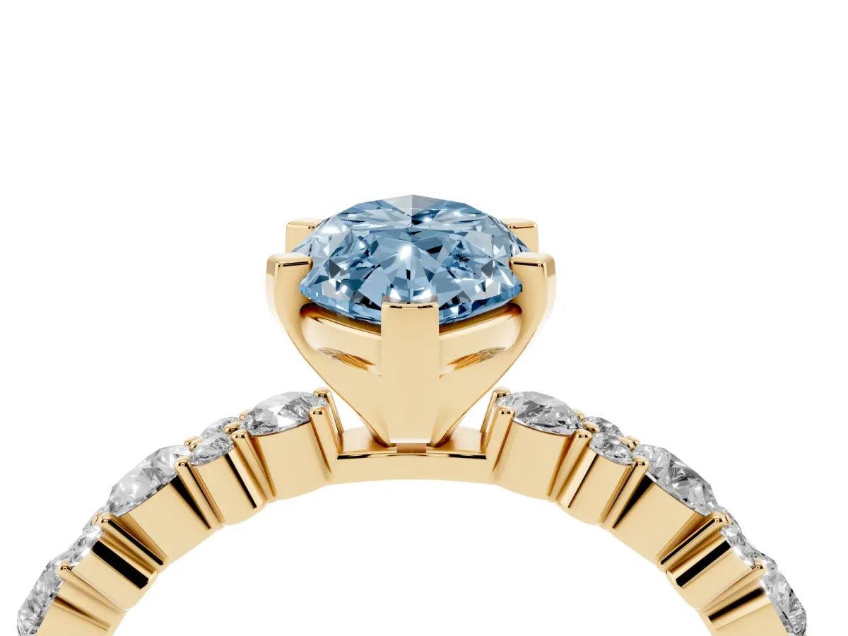 Fancy Blue Marquise Cut Diamond Side Stone Solitaire Ring with Round and Four-Prong Setting Yellow gold
