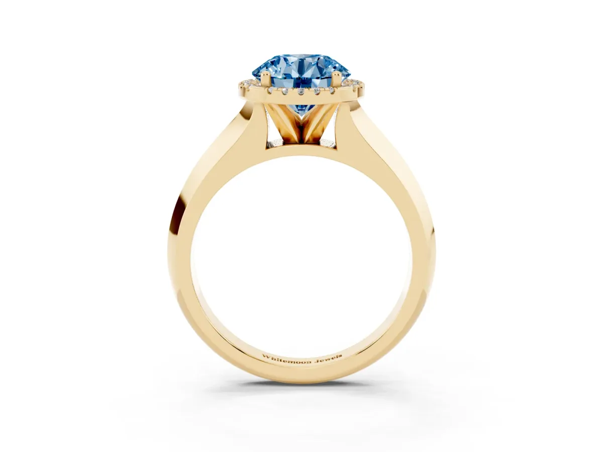 Fancy Blue Round Cut Halo Diamond Ring with Cathedral Band and Four-Prong Setting Yellow gold