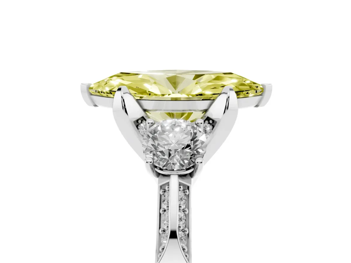 Fancy Yellow Marquise Cut Brilliant Three-Stone Diamond Ring with Pavé Band and Four-Prong Setting Platinum