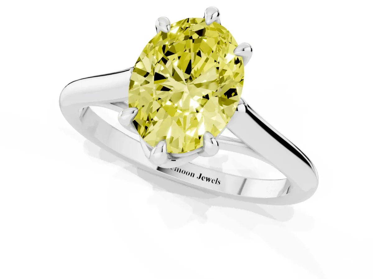 Fancy Yellow Oval Cut Solitaire Engagement Ring with Six-Prong Setting and Classic Band Platinum