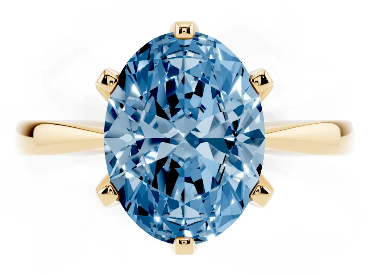 Fancy Blue Oval Cut Solitaire Engagement Ring with Six-Prong Setting and Tapered Band Yellow gold