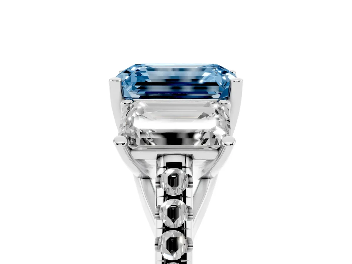 Fancy Blue Three-Stone Emerald Cut Diamond Ring with Round Pavé Band and Prong Setting Silver