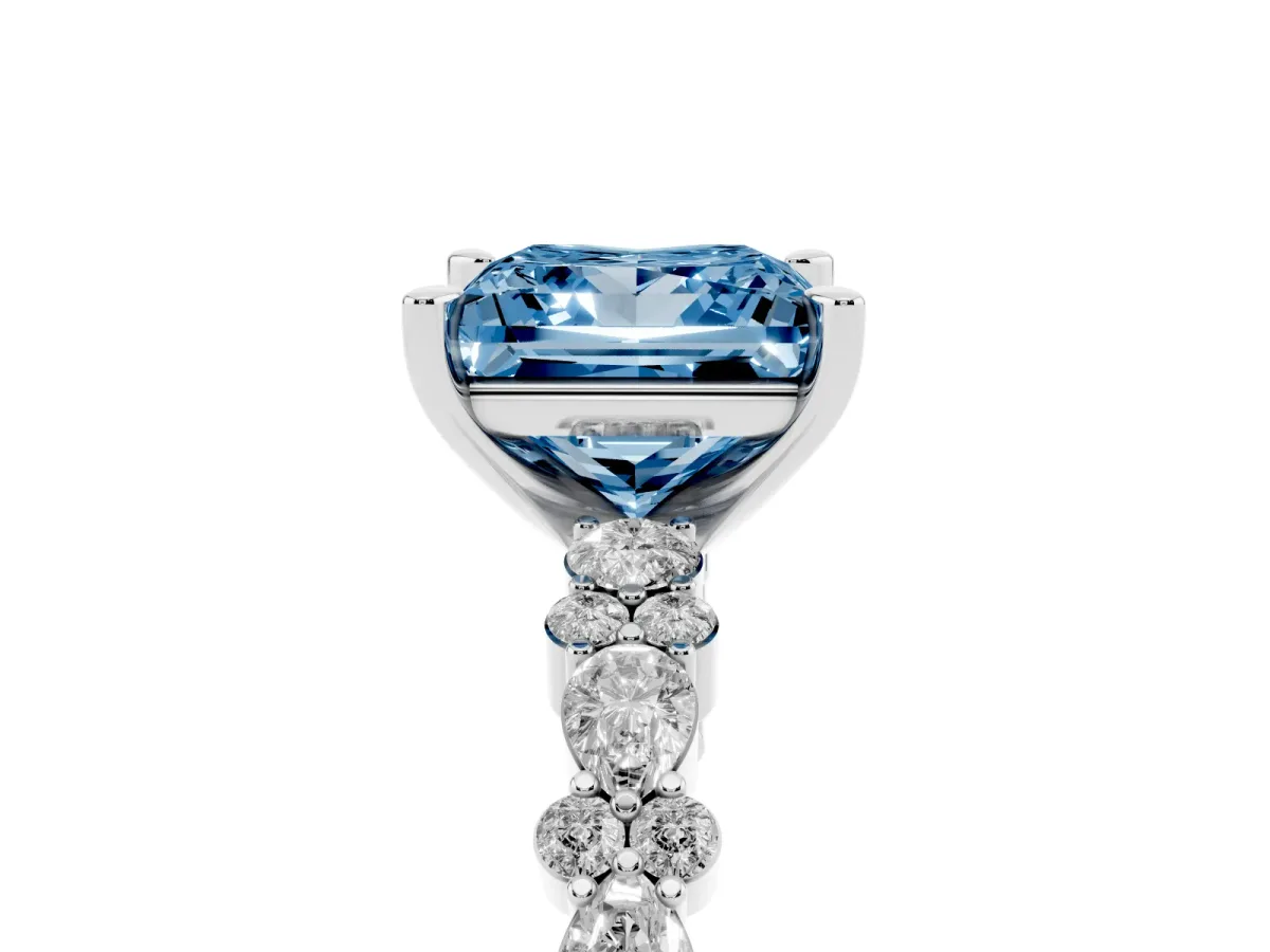 Fancy Blue Princess Cut Diamond Side Stone Solitaire Ring with Round and Four-Prong Setting Silver