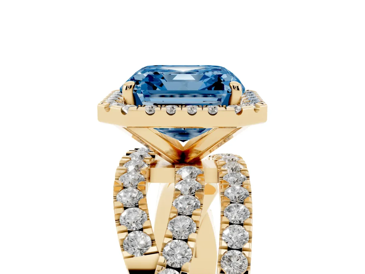 Fancy Blue Asscher Cut Diamond Halo Ring with Round Split Shank and Prong Setting Yellow gold
