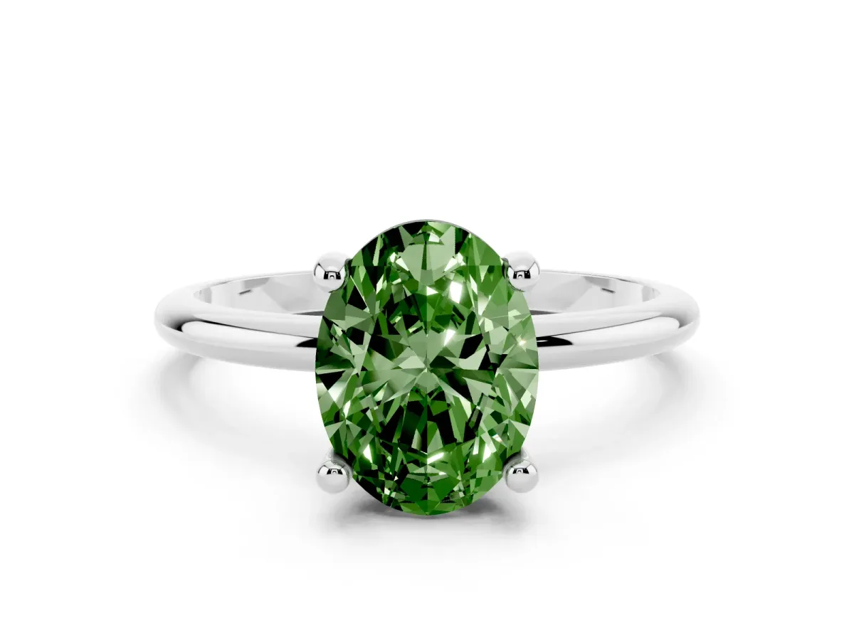 Fancy Green Oval Cut Solitaire Diamond Ring with 4-Prong Setting on a Classic Band Silver