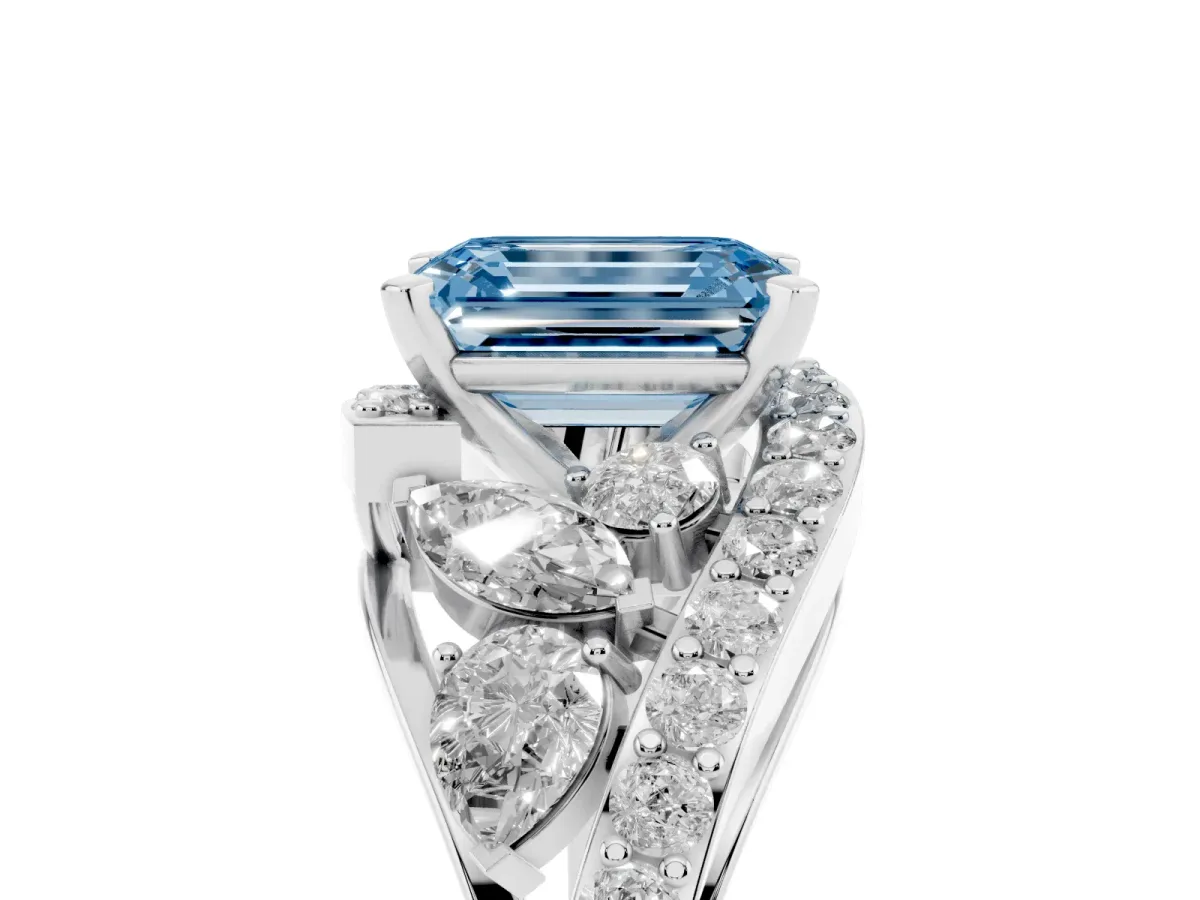 Fancy Blue Emerald Cut Diamond Halo Ring with Marquise and Pavé Band in Prong Setting White gold