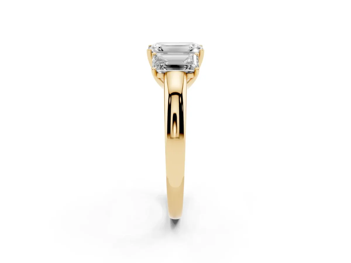 Emerald Cut Diamond Three-Stone Ring with Four-Prong Setting and Classic Band Yellow gold