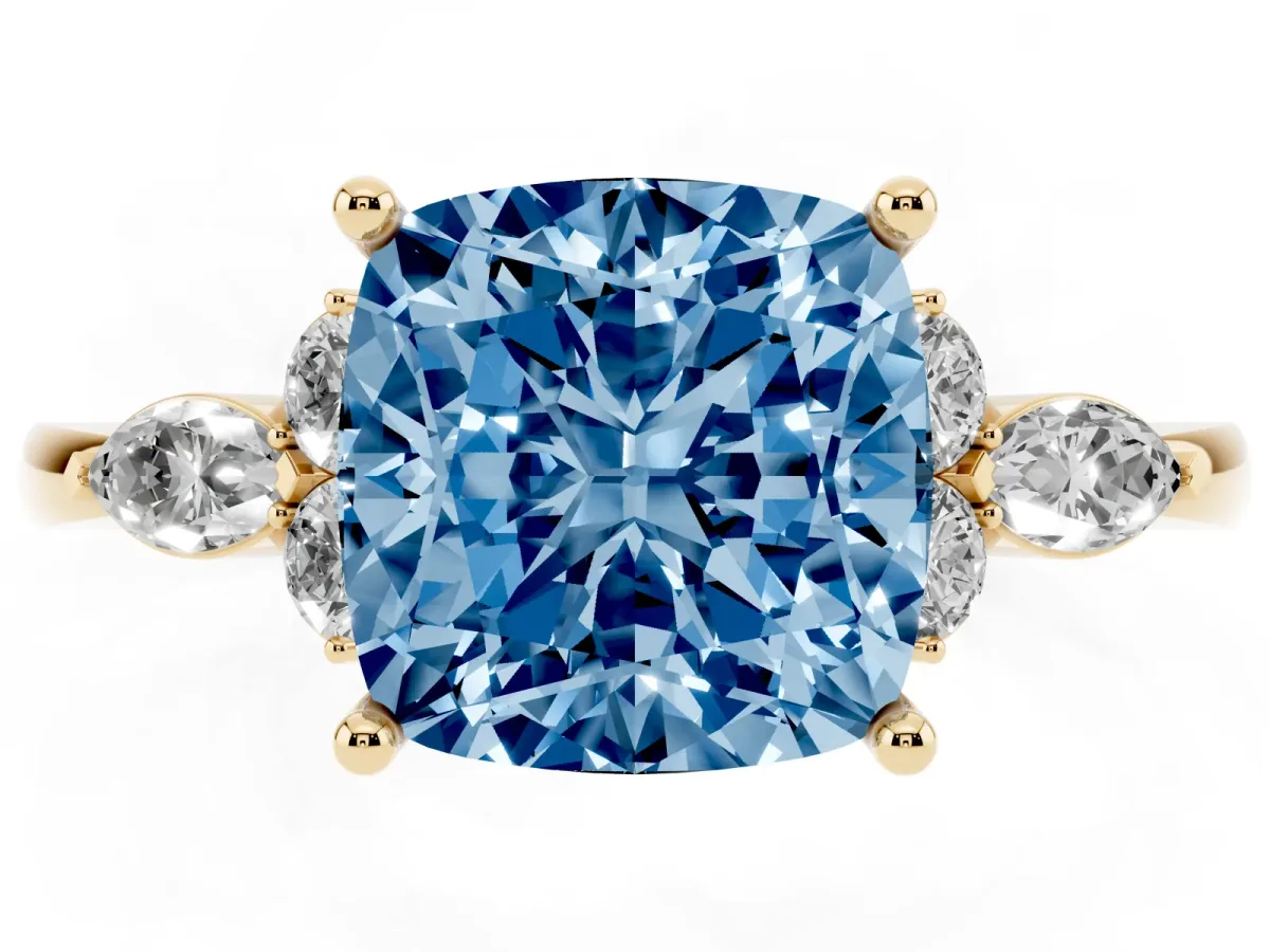 Fancy Blue Cushion Cut Brilliant Diamond Solitaire Ring with Pear Side Stones and Four-Prong Setting Yellow gold