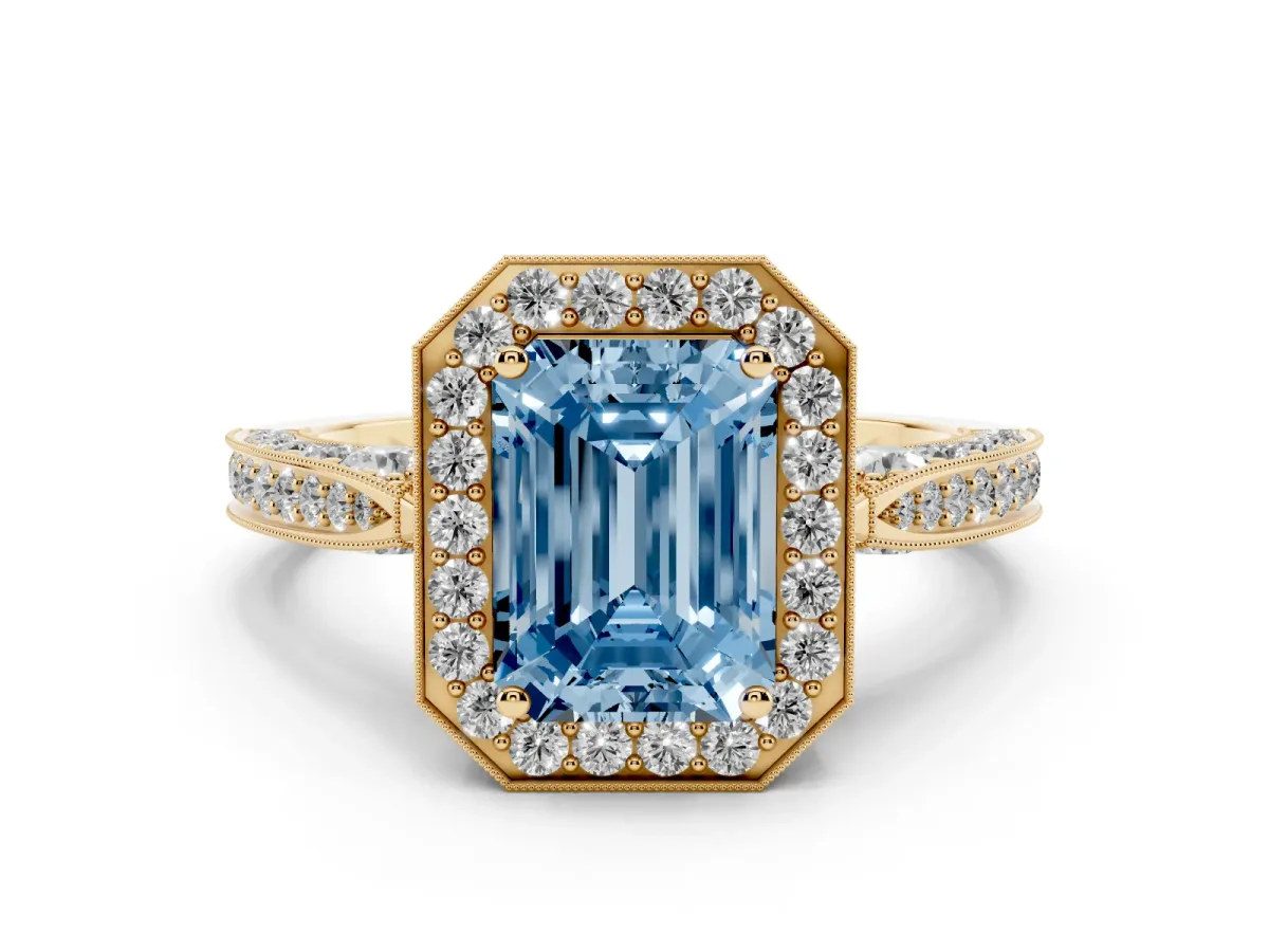 Fancy Blue Emerald Cut Halo Diamond Engagement Ring with Split Shank Band and Four-Prong Setting Yellow gold