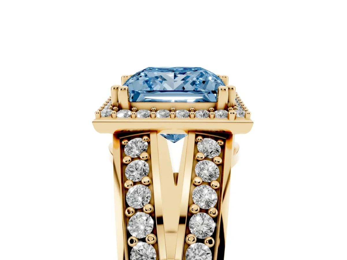 Fancy Blue Princess Cut Diamond Halo Ring with Split Shank Pavé Band and Four-Prong Setting Yellow gold