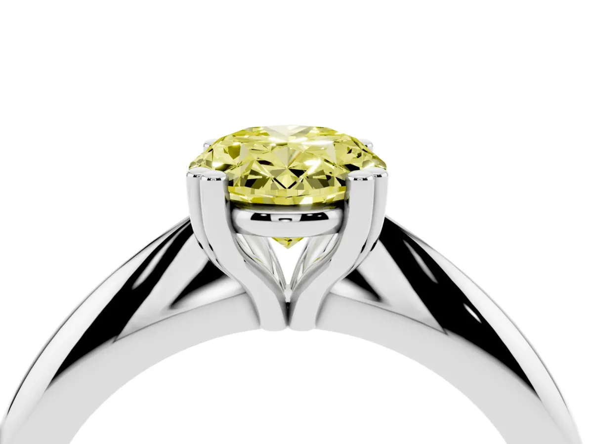 Fancy Yellow Oval Cut Cut Solitaire Engagement Ring with Tapered Band and Four-Prong Setting Silver