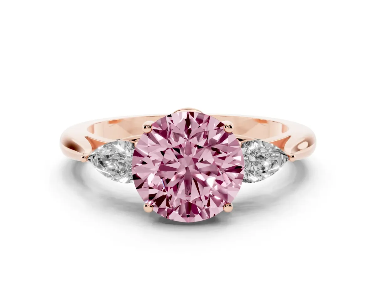Fancy Pink Three-Stone Round Cut Brilliant Diamond Solitaire Ring with Tapered Band and Four-Prong Setting Rose gold