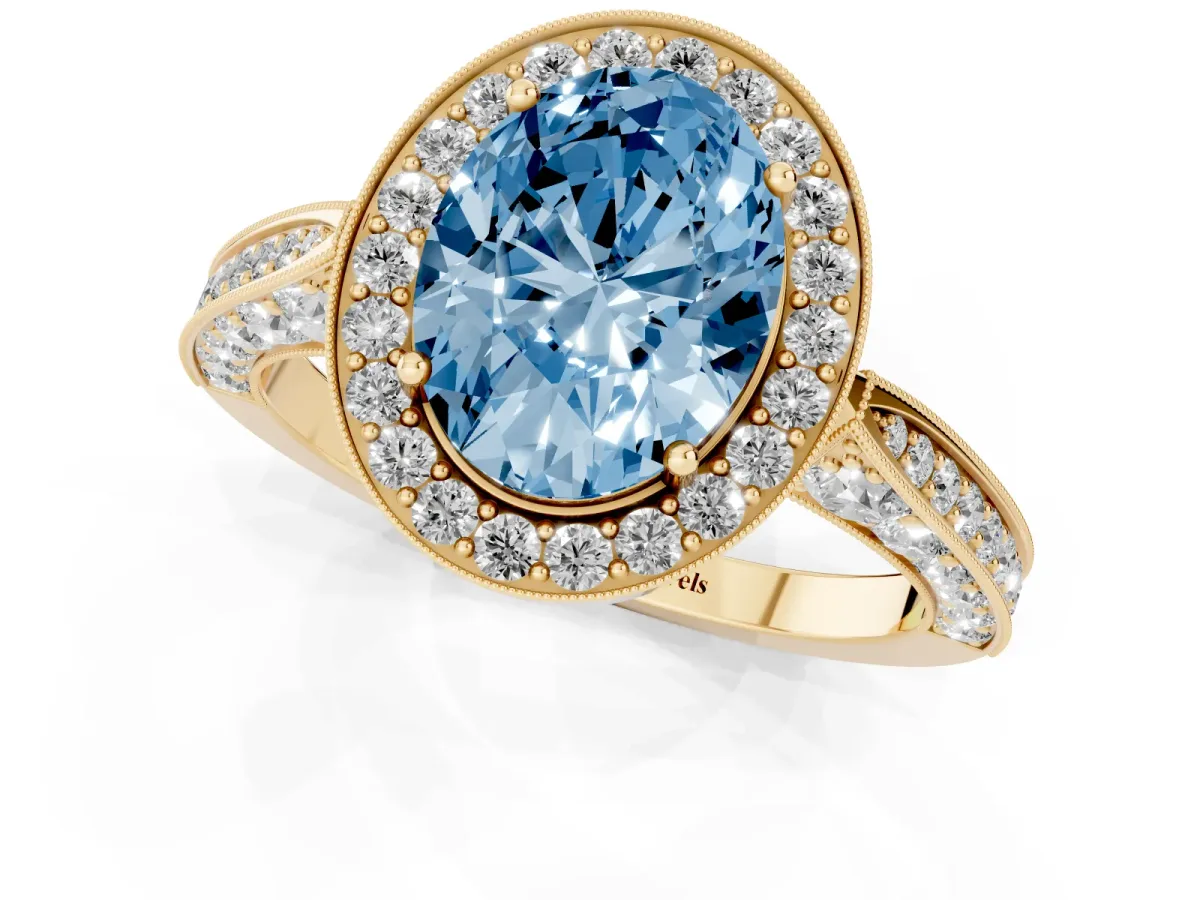 Fancy Blue Oval Cut Halo Diamond Engagement Ring with Split Shank Band and Four-Prong Setting Yellow gold
