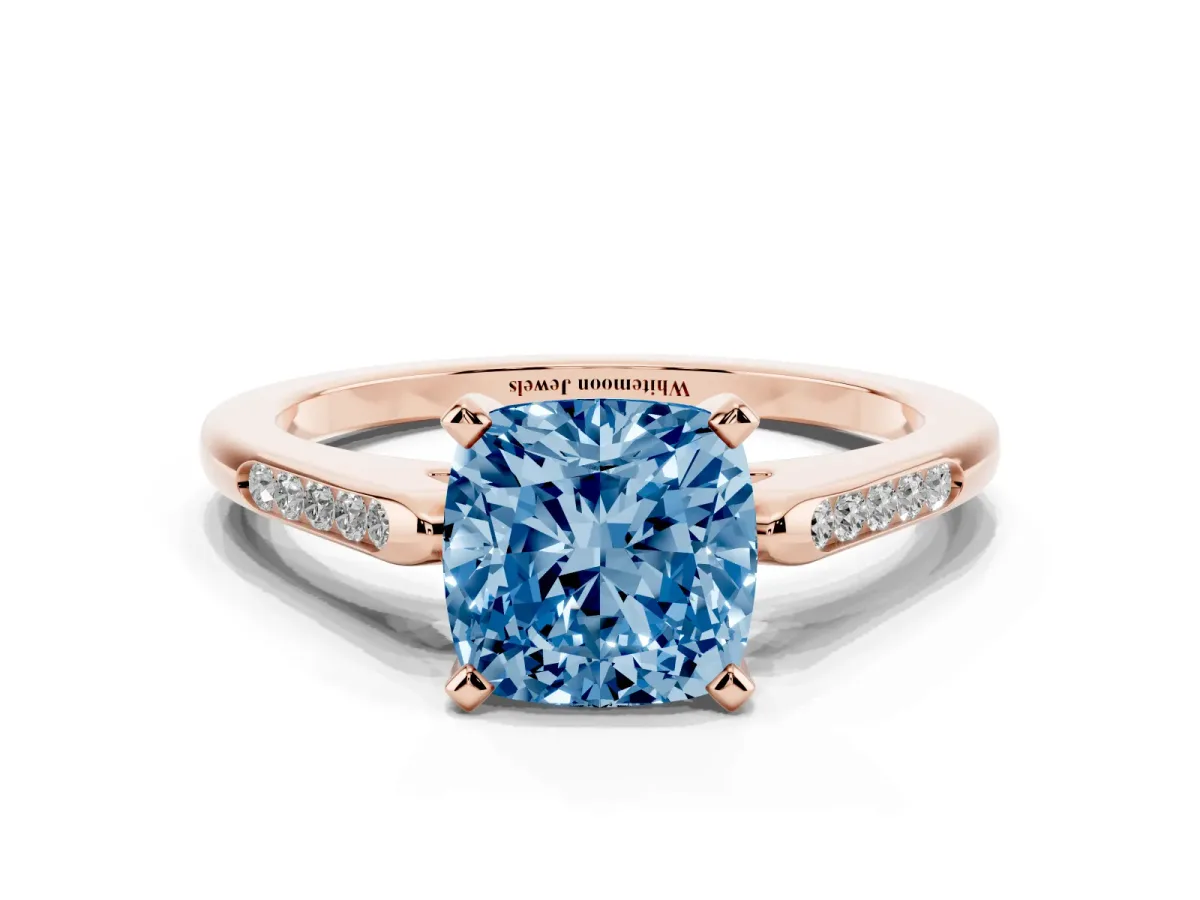 Fancy Blue Cushion Cut Diamond Solitaire Ring with Channel Set Round Band and Prong Setting Rose gold