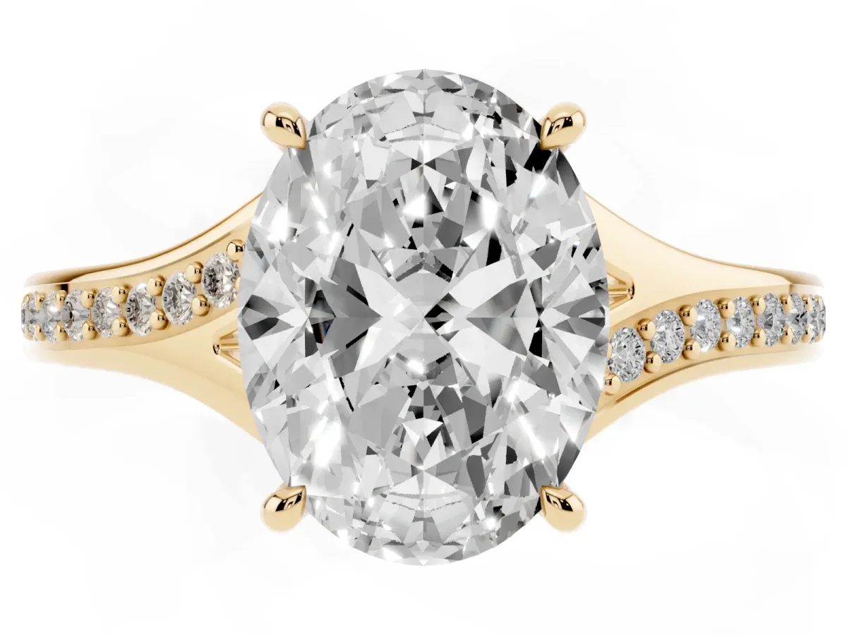 Oval Cut Diamond Solitaire Ring with Pavé Band and Prong Setting Yellow gold