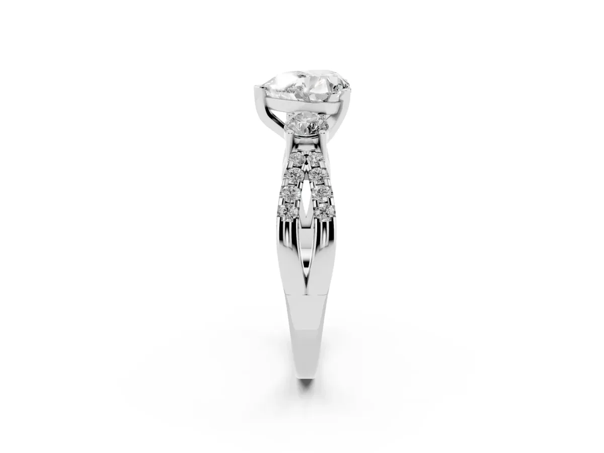 Heart Cut Diamond Three-Stone Ring with Pavé Split Shank and Four-Prong Setting White gold