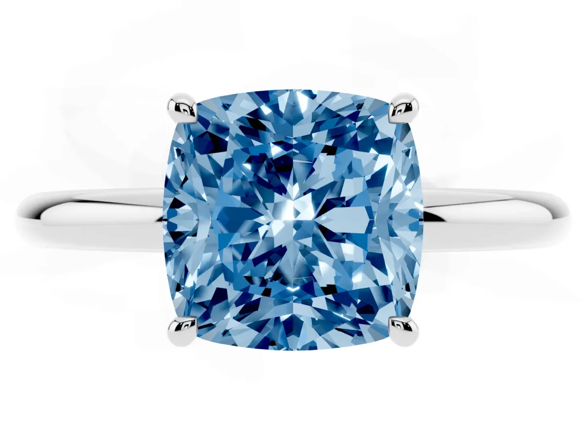 Fancy Blue Cushion Cut Diamond Solitaire Ring with Thin Band and Four-Prong Setting Platinum