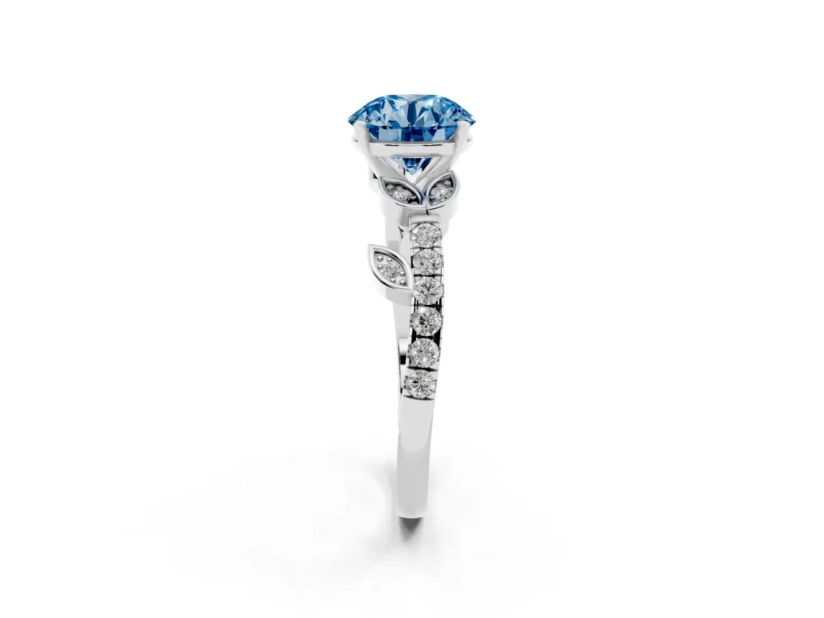 Fancy Blue Round Cut Solitaire Leaf-Inspired Diamond Ring with Pavé Band and Four-Prong Setting Silver