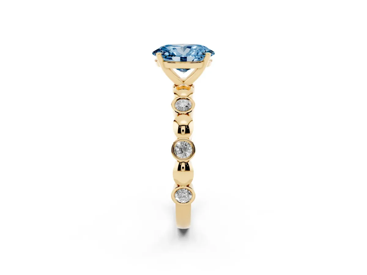 Fancy Blue Oval Cut Solitaire Bezel-Set Diamond Ring with Beaded Band and Four-Prong Setting Yellow gold