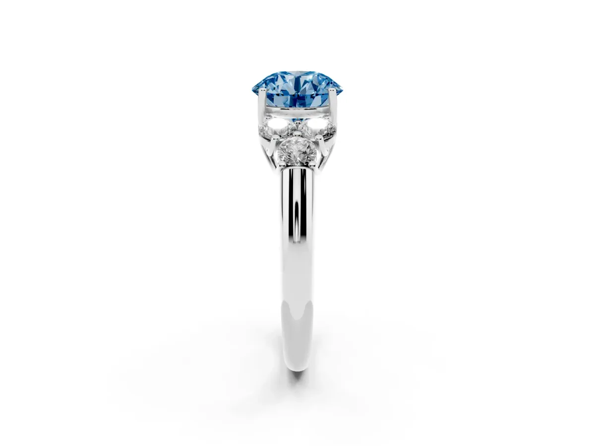 Fancy Blue Round Cut Cut Diamond Cluster Ring with Round Accent Stones and Prong Setting on a Classic Band Silver