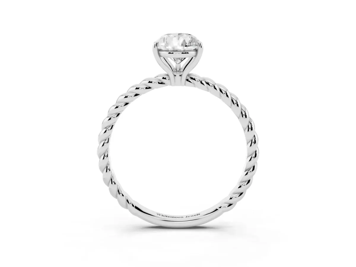 Pear Cut Solitaire Twist Band Ring with Four-Prong Setting Platinum