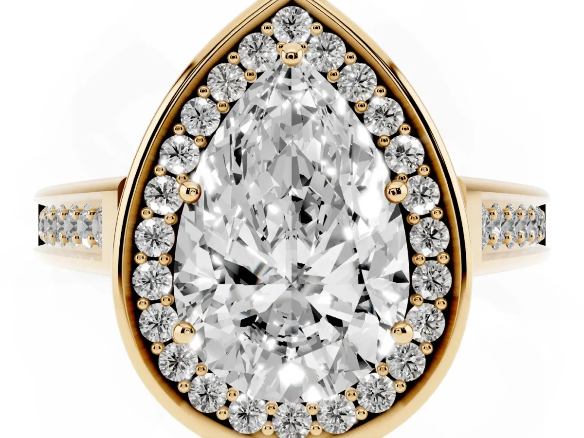 Pear Cut Halo Solitaire Diamond Ring with Pave Band and Bezel Setting Yellow gold