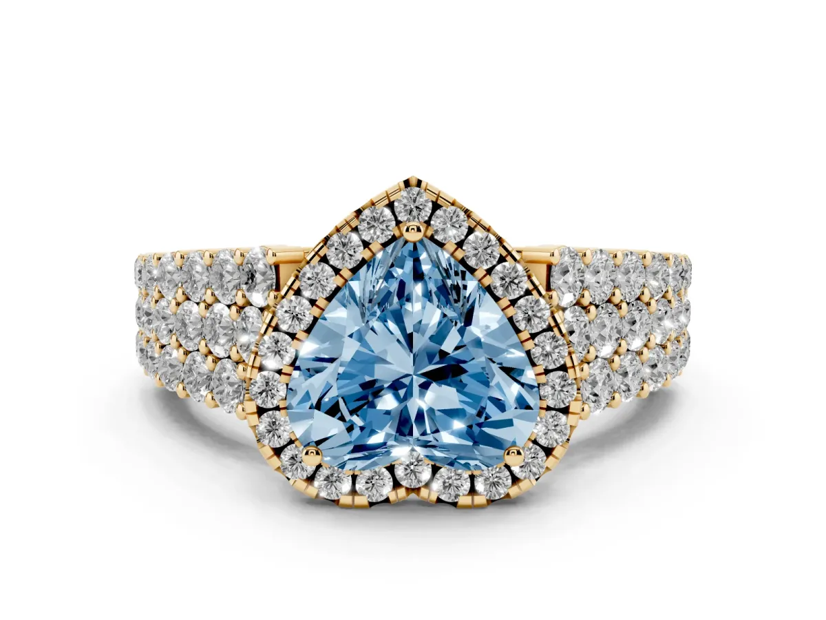 Fancy Blue Heart Cut Diamond Halo Engagement Ring with Triple Row Round Pavé Band and Prong Setting Yellow gold