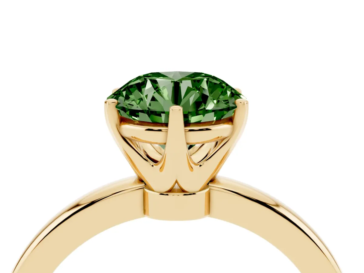 Fancy Green Round Cut Solitaire Diamond Ring with Six-Prong Setting on a Classic Band Yellow gold