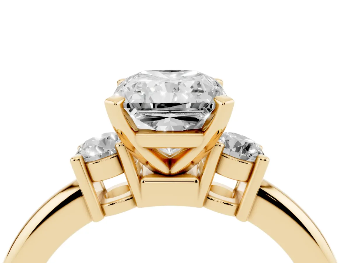 Three-Stone Radiant Cut Cut Diamond Solitaire with Prong Setting and Classic Band Yellow gold