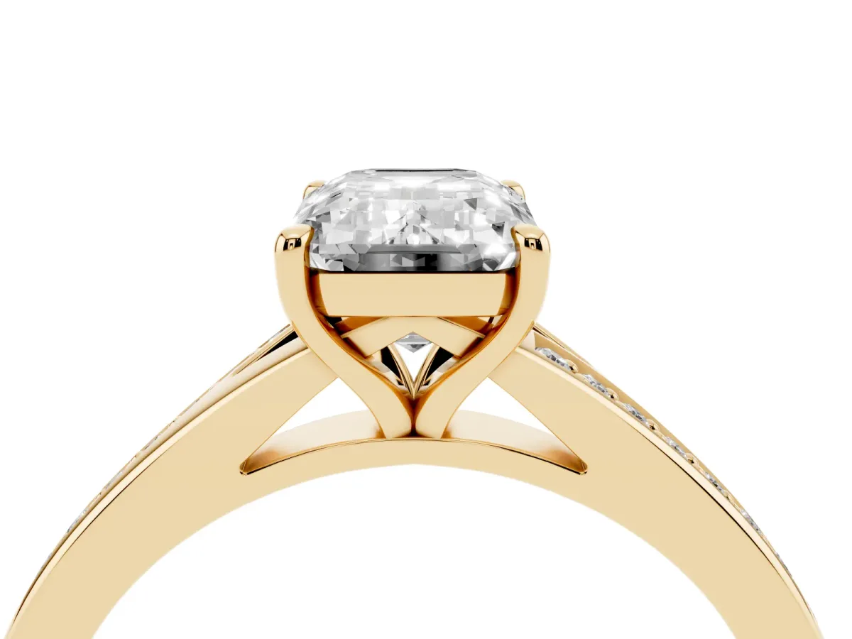 Emerald Cut Diamond Solitaire Ring with Pavé Band and Prong Setting Yellow gold