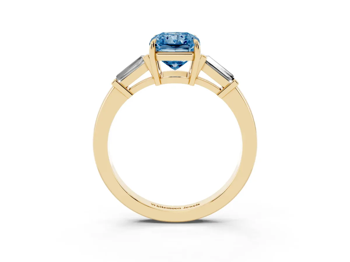 Fancy Blue Radiant Cut Diamond Three-Stone Ring with Tapered Baguette Side Stones and Prong Setting Yellow gold