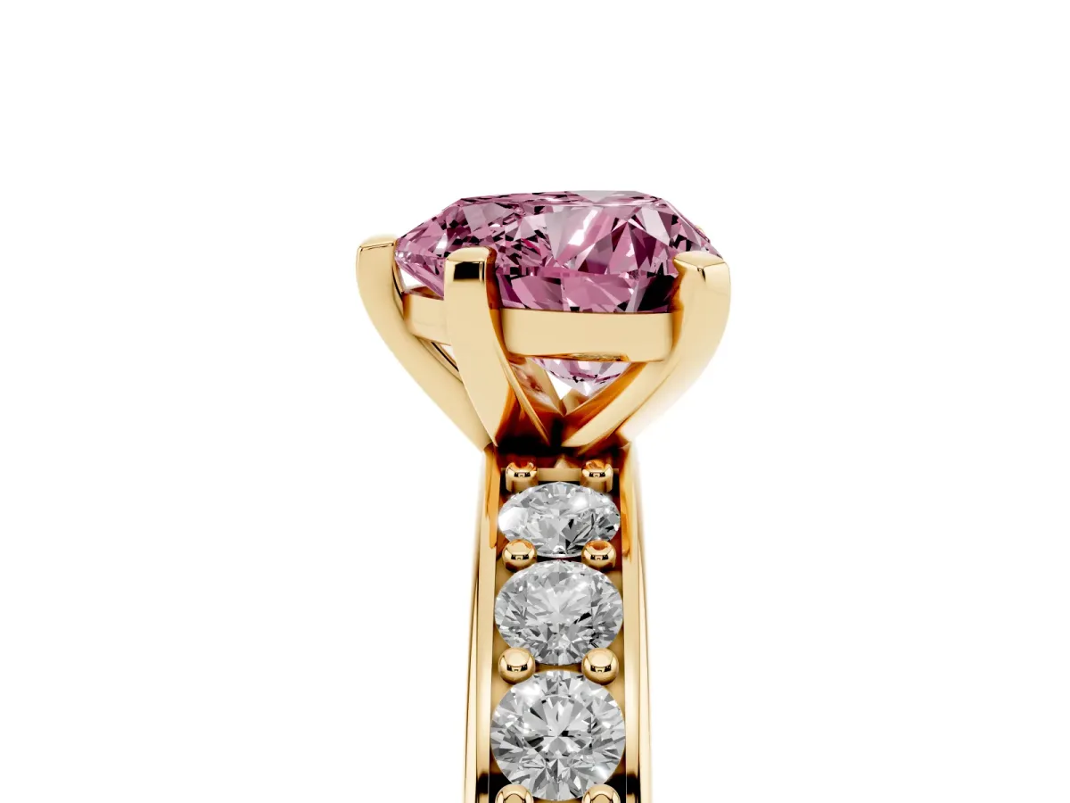 Fancy Pink Heart Cut Diamond Engagement Ring with Channel Set Round Band and Prong Setting Yellow gold