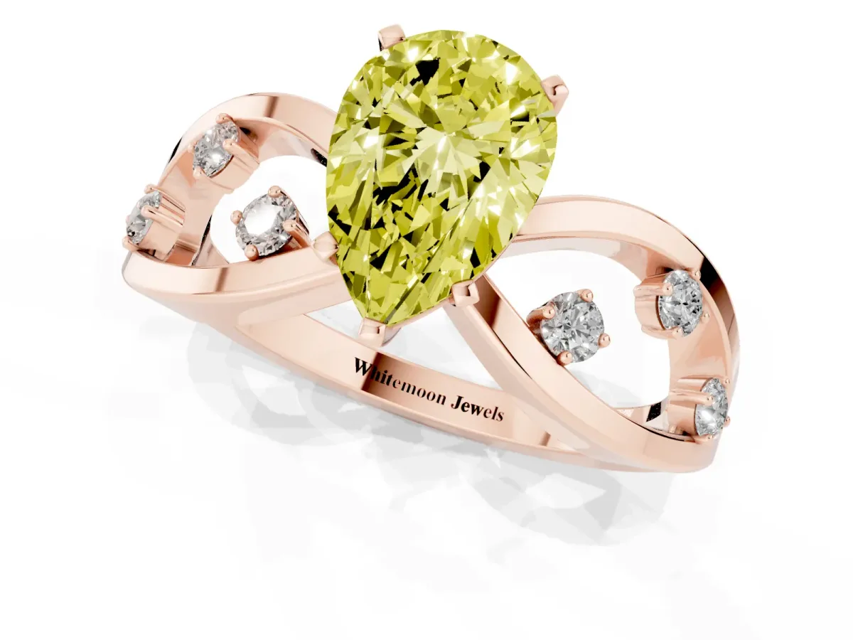 Fancy Yellow Pear Cut Cut Solitaire Diamond with Side Stones on Criss-Cross Band and Four-Prong Setting Rose gold