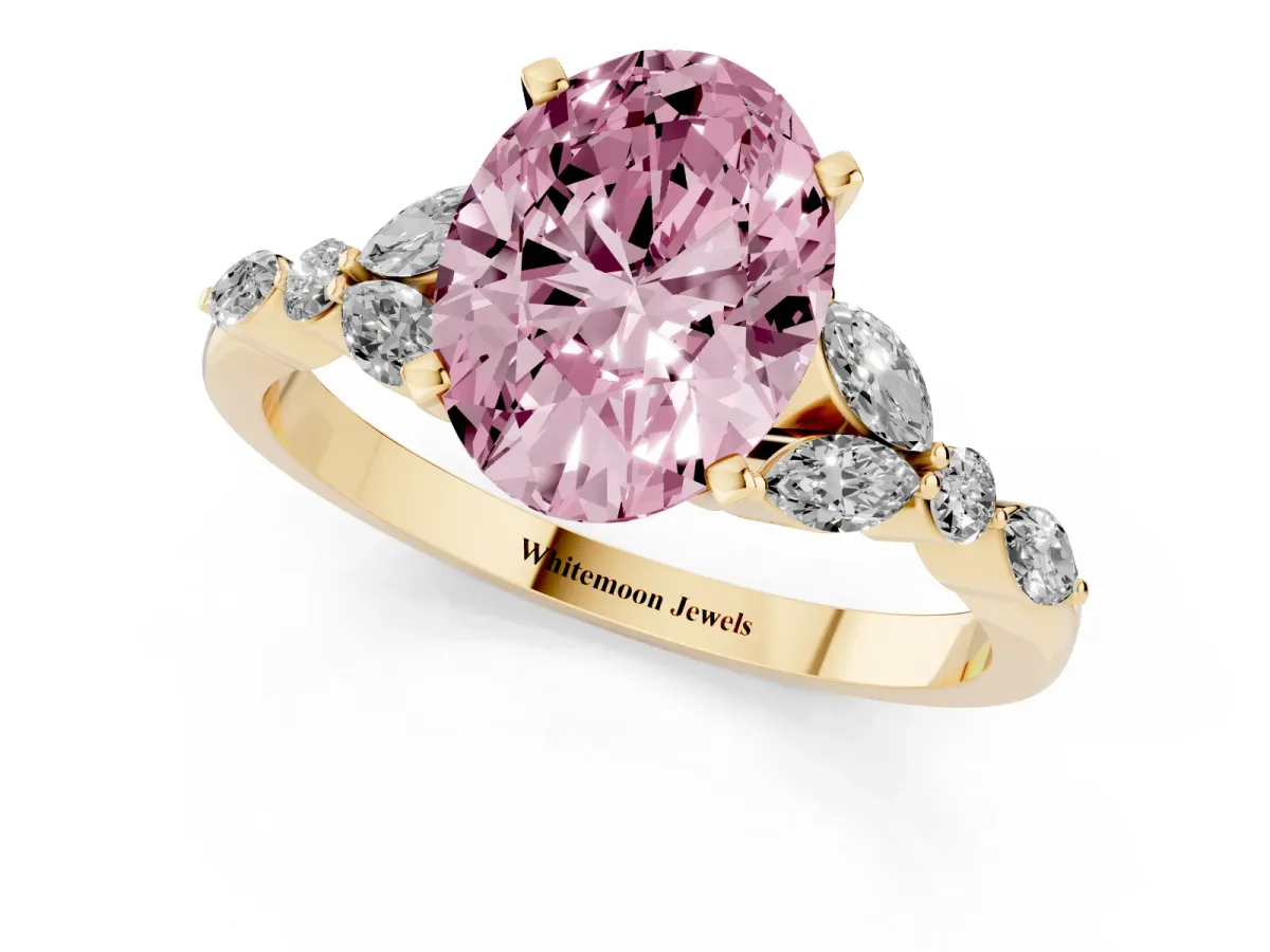 Fancy Pink Oval Cut Diamond Solitaire Ring with Side Stones and Four-Prong Setting Yellow gold