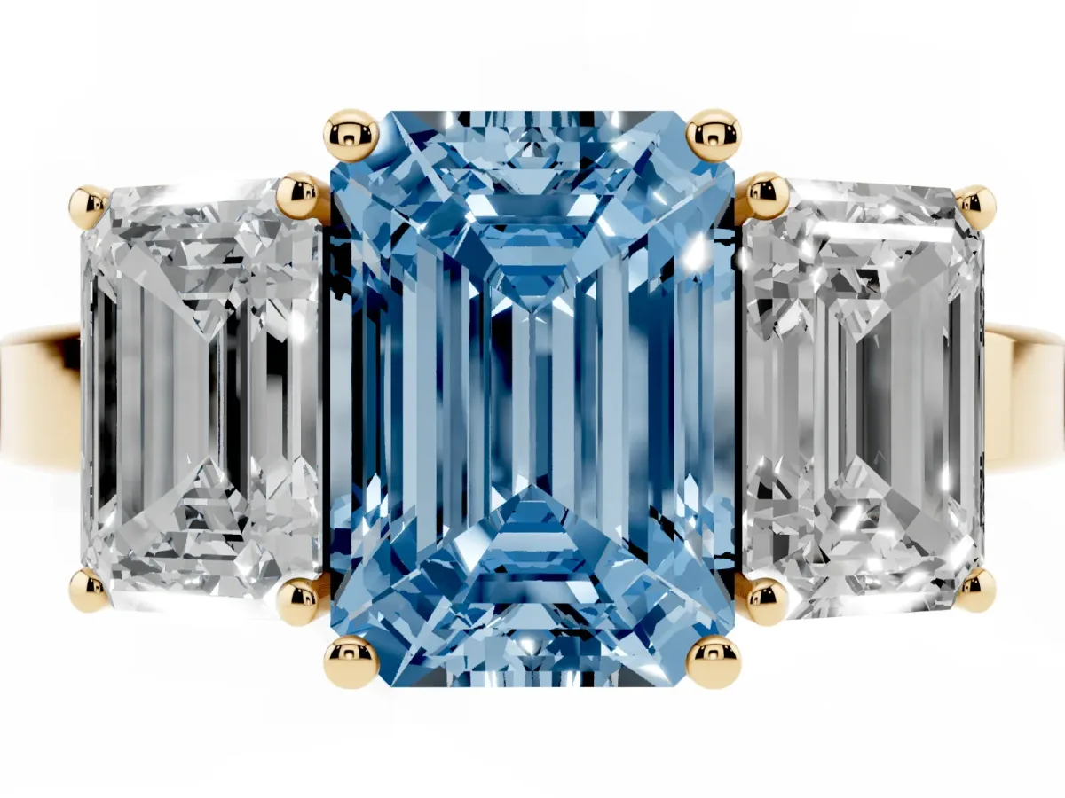 Fancy Blue Three-Stone Emerald Cut Cut Diamond Engagement Ring with Flat Band and Four-Prong Setting Yellow gold