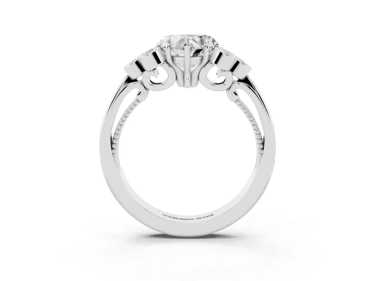 Heart Cut Cut Diamond Engagement Ring with Bezel Set Round Side Stones and Prong Setting Silver