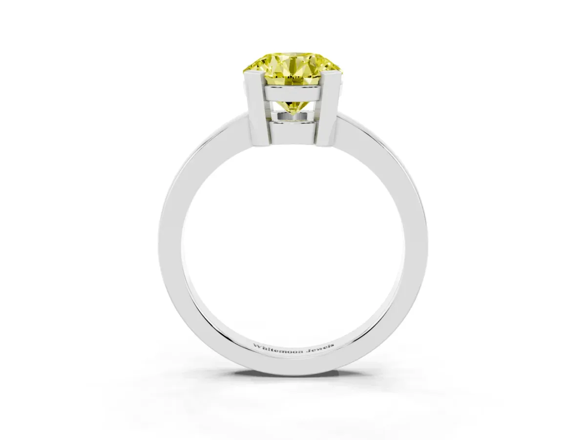 Fancy Yellow Round Cut Cut Solitaire Ring with Four-Prong Setting and Classic Band Silver