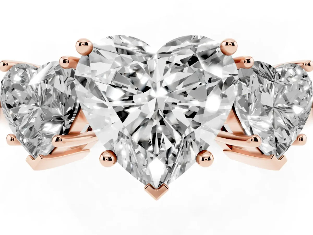 Three-Stone Heart Cut Cut Diamond Engagement Ring with Prong Setting on a White Gold Band Rose gold