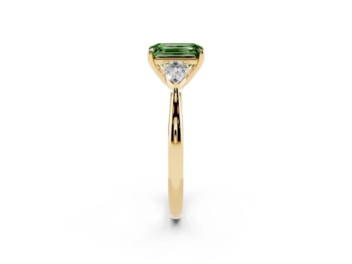 Fancy Green Emerald Cut Diamond Three-Stone Ring with Pear Side Stones and Prong Setting Yellow gold