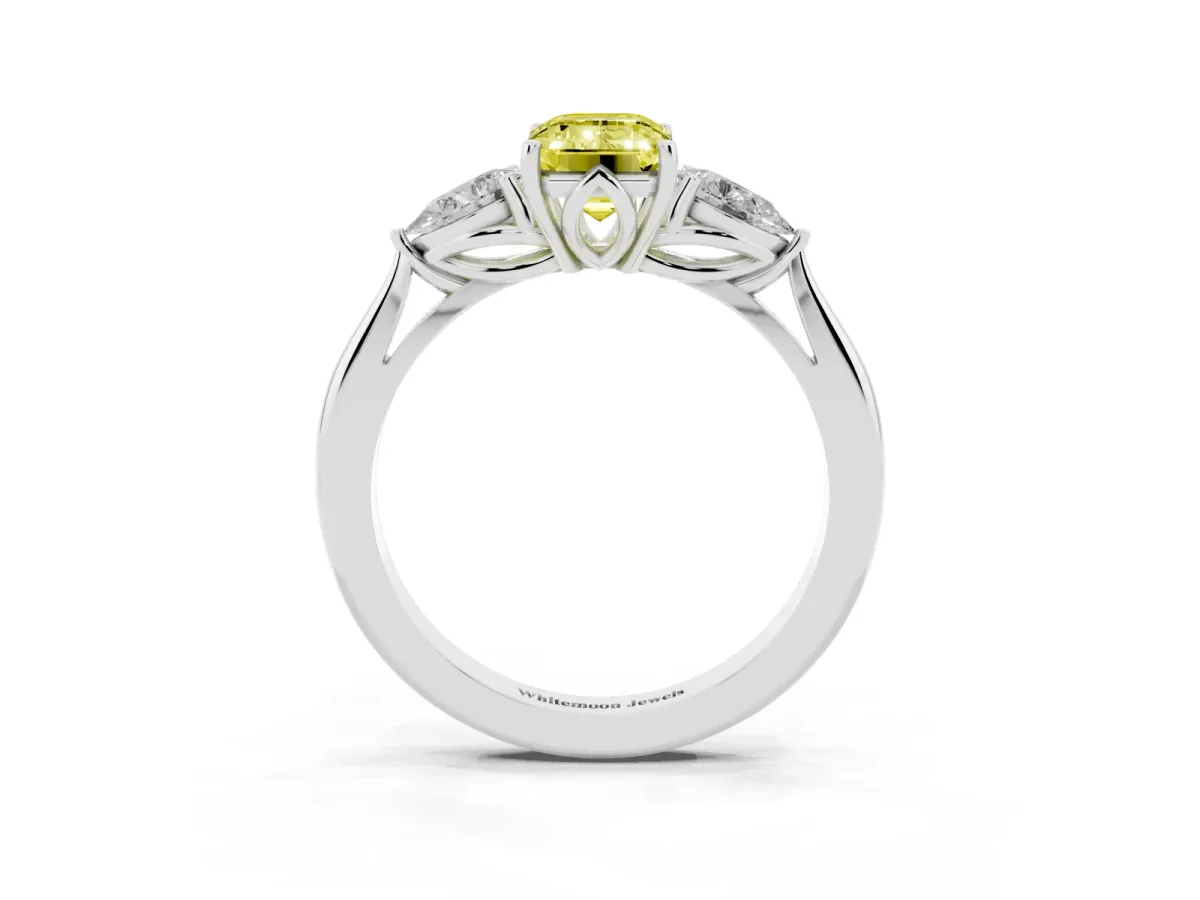 Fancy Yellow Three-Stone Emerald Cut Diamond Ring with Pear Side Stones in Four-Prong Setting Silver