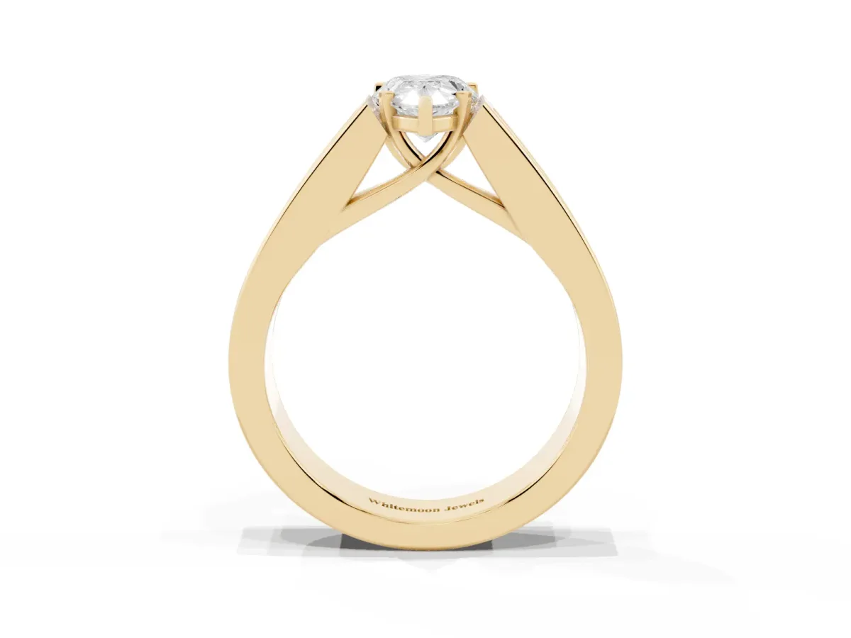 Pear Cut Cut Channel Set Solitaire Ring with Four-Prong Setting Yellow gold