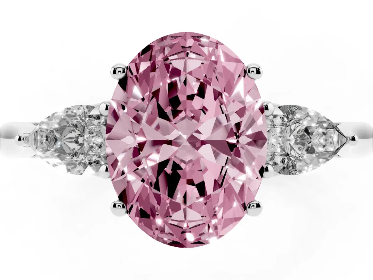 Fancy Pink Three-Stone Oval Cut Brilliant Diamond Solitaire Ring with Tapered Band and Four-Prong Setting Platinum