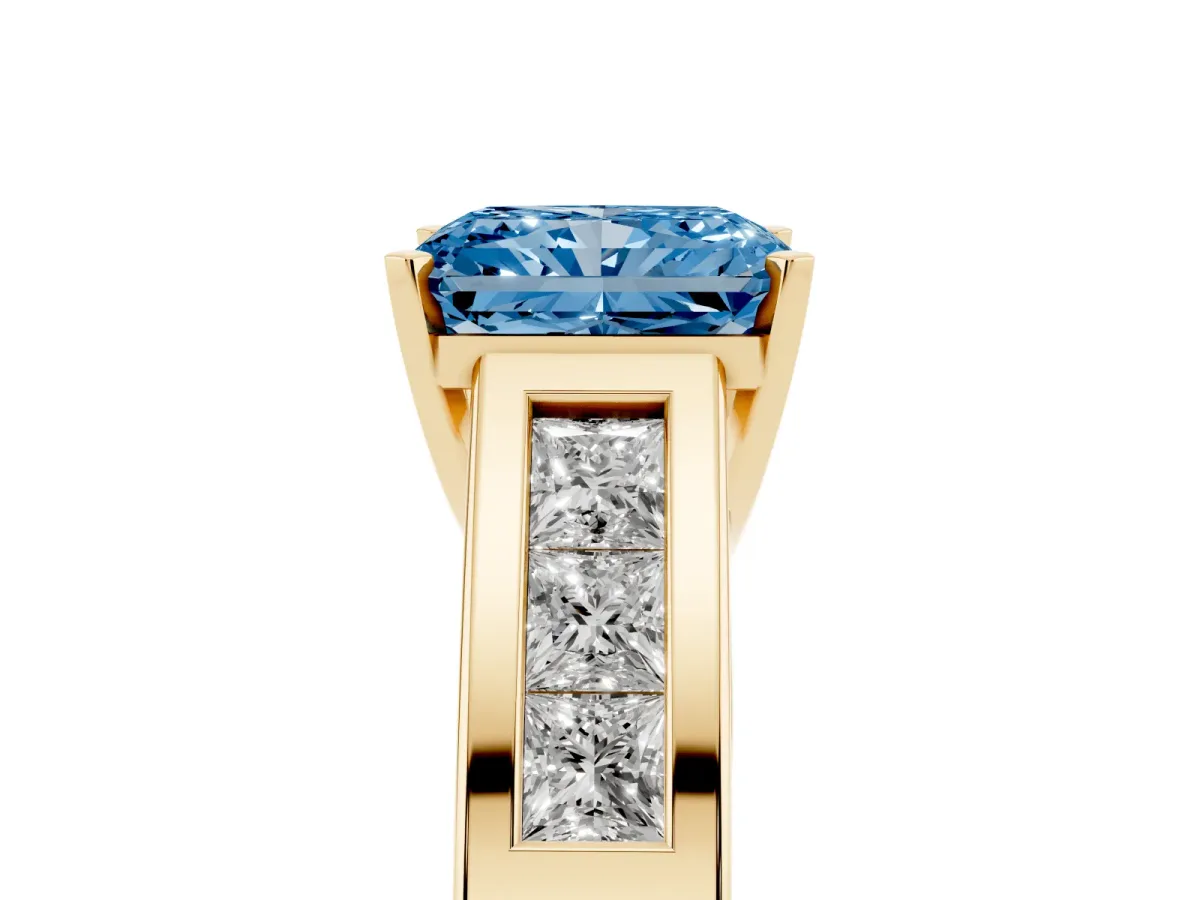 Fancy Blue Radiant Cut Cut Channel Set Solitaire Ring with Four-Prong Setting Yellow gold