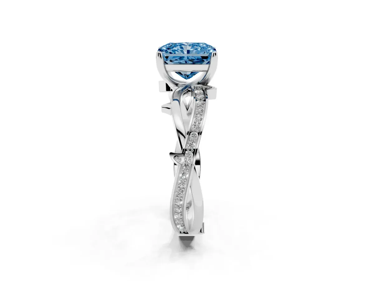 Fancy Blue Radiant Cut Solitaire Twist Band with Pavé Accents and Four-Prong Setting Silver