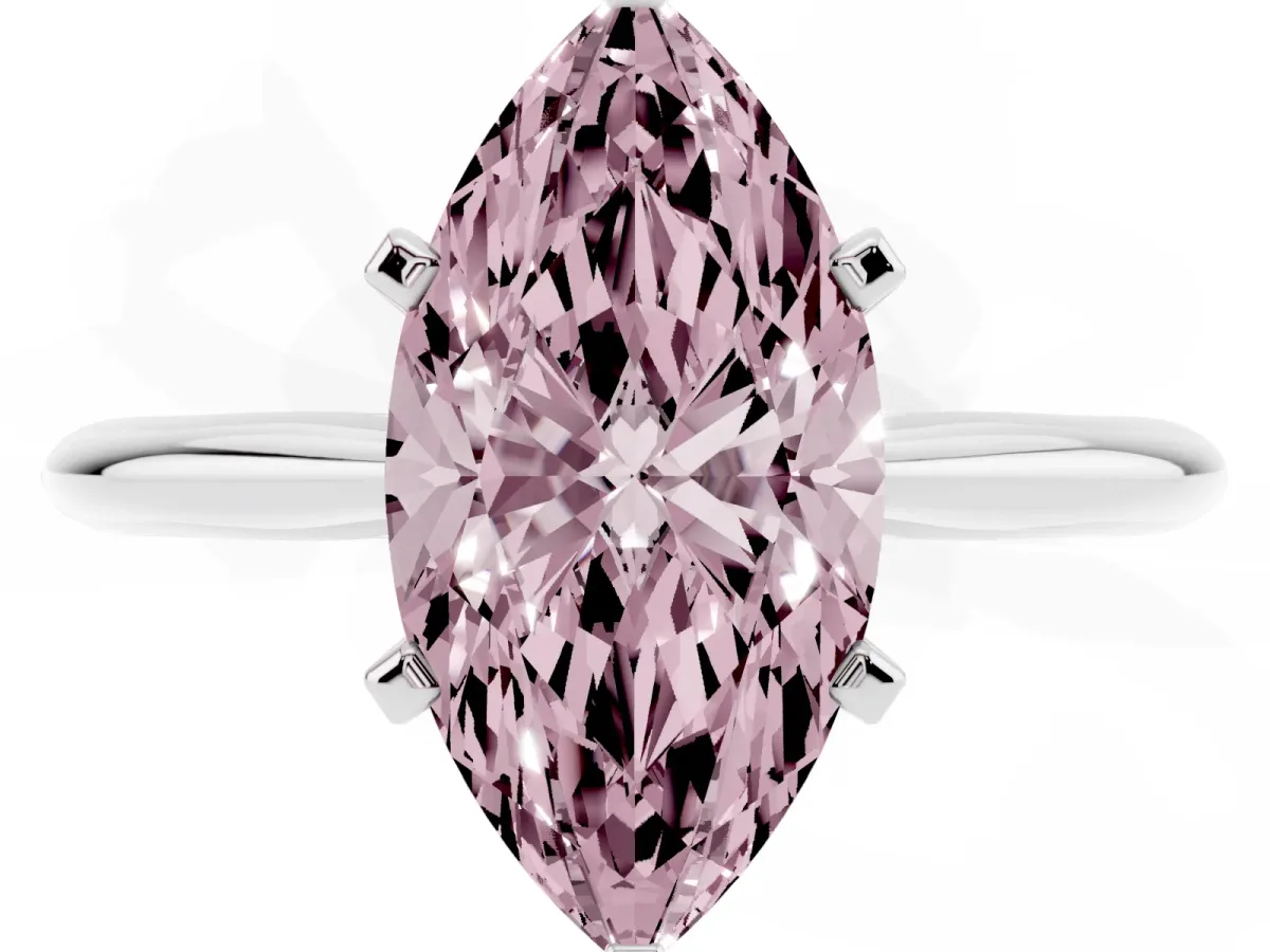 Fancy Pink Marquise Cut Cut Solitaire Ring with Four-Prong Setting on a Classic Band Silver