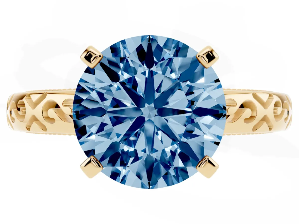 Fancy Blue Round Cut Solitaire Engagement Ring with Scrollwork Band and Four-Prong Setting Yellow gold