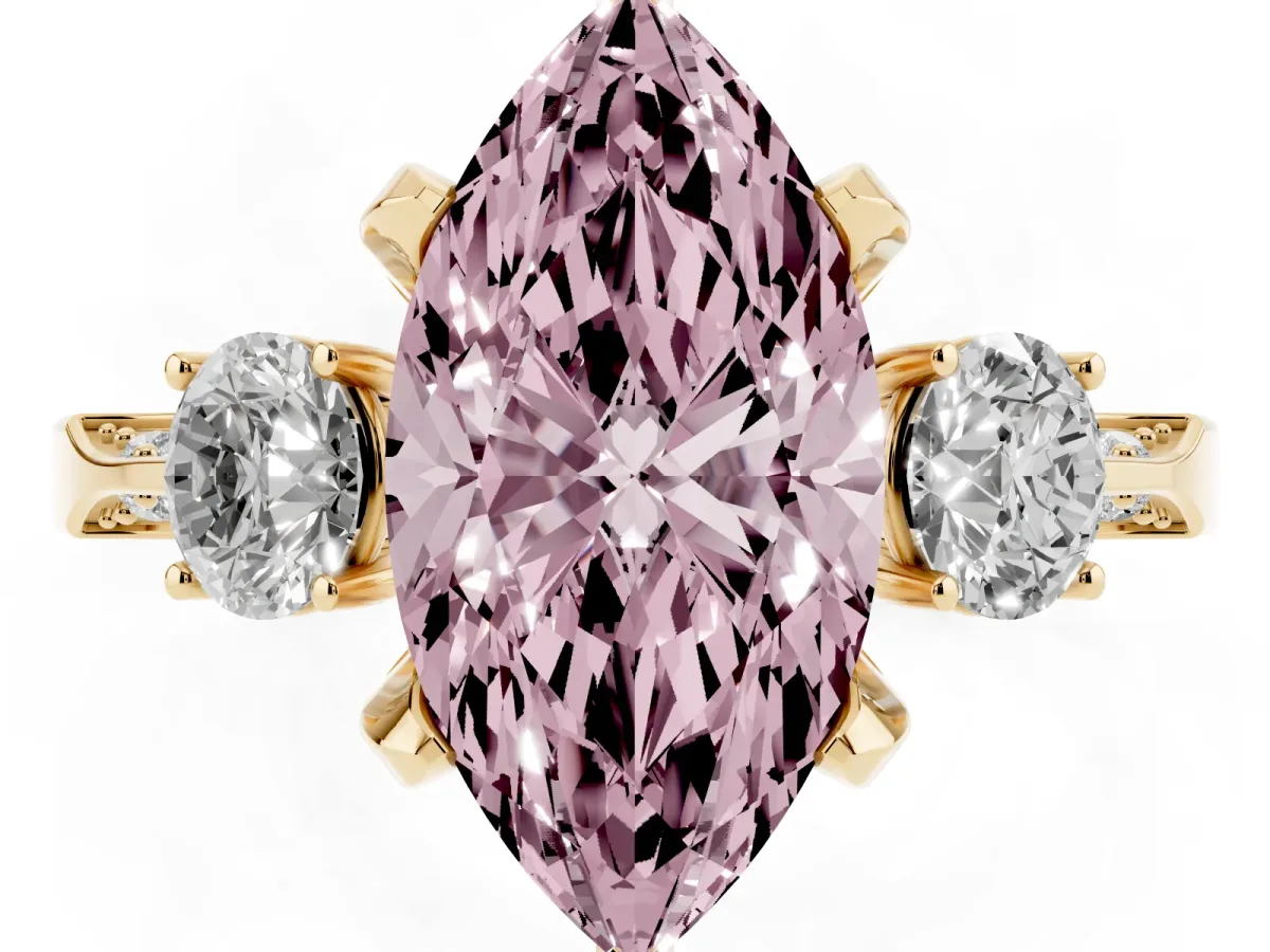 Fancy Pink Marquise Cut Brilliant Three-Stone Diamond Ring with Pavé Band and Four-Prong Setting Yellow gold