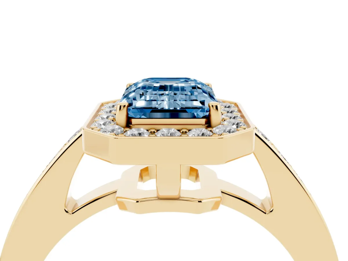 Fancy Blue Emerald Cut Halo Pavé Diamond Engagement Ring with Bezel Setting Yellow gold