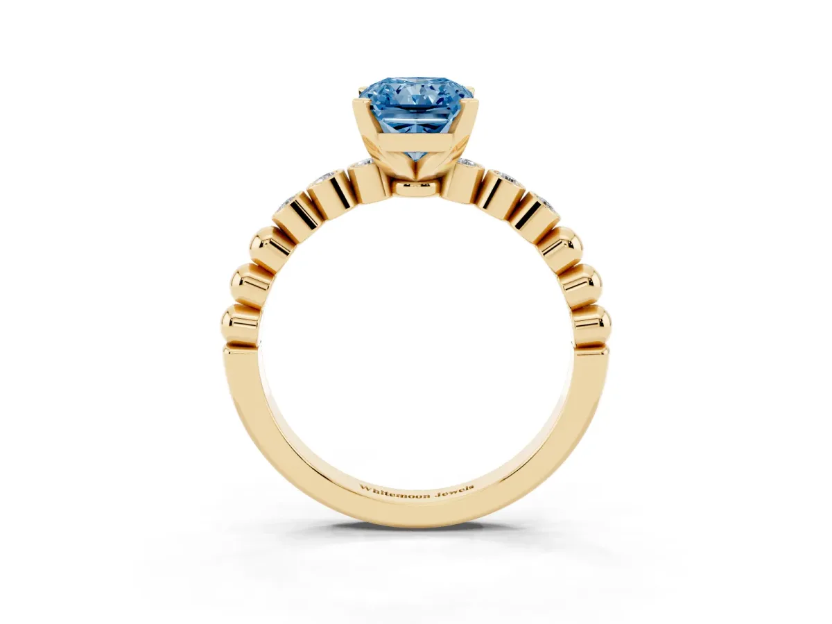 Fancy Blue Radiant Cut Solitaire Bezel Accent Diamond Engagement Ring with Beaded Band and Four-Prong Setting Yellow gold