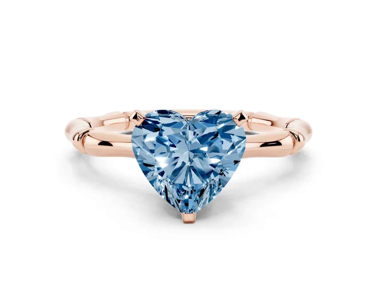 Fancy Blue Heart Cut Solitaire Diamond Ring with Bamboo Band and Four-Prong Setting Rose gold